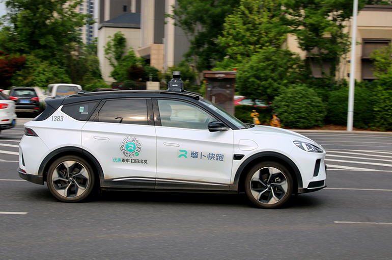 A Baidu's Apollo Robo Taxi on road